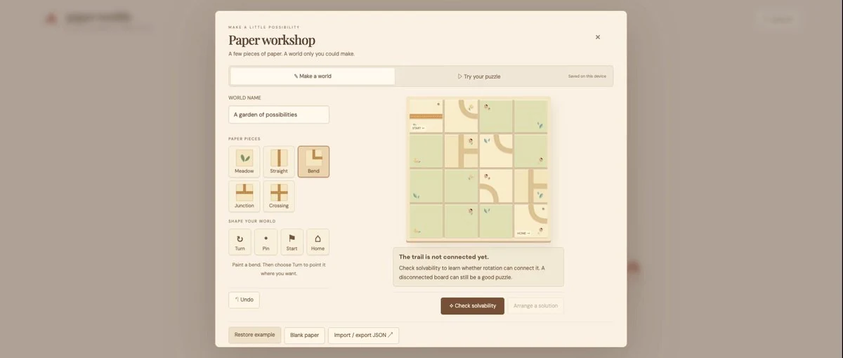 Paper Worlds workshop with a tile palette, editable paper board and solvability check.
